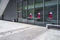 some very nice buildings that have banners in front of them at the doors of the building