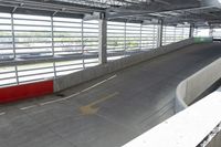 the interior of an air port building with a large open area for moving planes and trucks