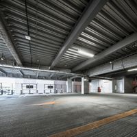 Modern Architecture Building with Open Space Parking Lot