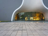 a picture of a building with a very modern entrance, it is very modern and there is a nice looking floor