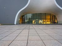 a picture of a building with a very modern entrance, it is very modern and there is a nice looking floor