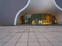 a picture of a building with a very modern entrance, it is very modern and there is a nice looking floor