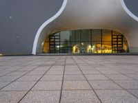 a picture of a building with a very modern entrance, it is very modern and there is a nice looking floor