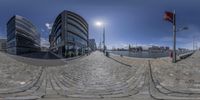 this is a fish eye photo of a building on the waterfront of a port in the uk