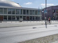 an empty city street that is in the daytime time with several signs on it's sides