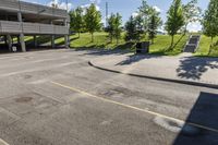 this street has a parking garage, and it's empty but a road will be perfect