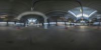 multiple frames of the view in motion at a train station's entrance and ceiling