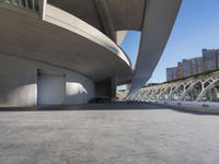 Modern Architecture: A Cityscape with a Concrete Bridge