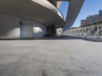 Modern Architecture: A Cityscape with a Concrete Bridge