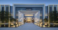 the entrance to an hotel with an asian - style entrance and a courtyard leading up to it