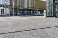 the person on the skateboard is skating down the street outside the building that houses the headquarters