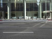 an image of city street corner during day time with no one visible on the corner