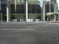 an image of city street corner during day time with no one visible on the corner