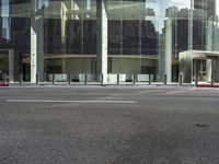 an image of city street corner during day time with no one visible on the corner