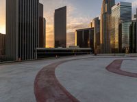 there are many tall buildings next to each other in a city setting of sunsets