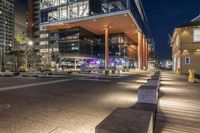 Modern Architecture in a Coastal City at Night