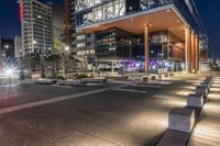 Modern Architecture in a Coastal City at Night