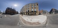 a large building with a building front is shown in this 360 - camera photograph in downtown, minnesota