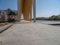 Modern Architecture in Egypt: Palm Trees under a Clear Sky