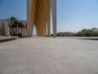 Modern Architecture in Egypt: Palm Trees under a Clear Sky