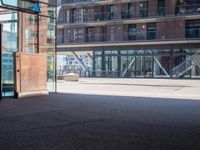 the entrance to an office building has been opened up in front of it's glass doors