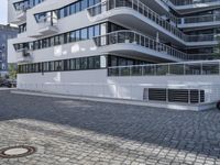 this is a photo of a building with several stories of glass windows on the outside