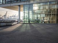 a large building that has windows that are outside in a city place of different shapes