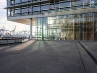 a large building that has windows that are outside in a city place of different shapes