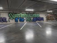 a large room with graffiti on the wall and a ramp in the background that reads supremeord