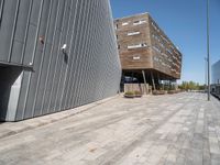 a street view with an empty area near a building in the middle of the photo