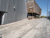 a street view with an empty area near a building in the middle of the photo
