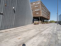 a street view with an empty area near a building in the middle of the photo