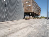 a street view with an empty area near a building in the middle of the photo