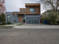 a house with modern architecture is shown in this picture, but no one has a garage