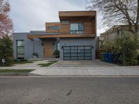 a house with modern architecture is shown in this picture, but no one has a garage