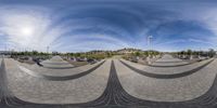 a photo taken from the side of a skateboard ramp with multiple wavy patterns on it