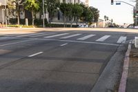 a crosswalk area in a city that looks like there is no traffic on the street