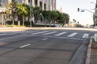 a crosswalk area in a city that looks like there is no traffic on the street