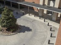 this school has two parking spaces, two stairs and an entrance that leads to the second floor