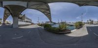 a boat is moored at a marina in the marina district as a fish eye lens is captured