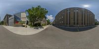 a wide angle photo of several buildings in a row with no people standing in front