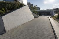 a view of an outside area of an office building with large windows and a circular driveway