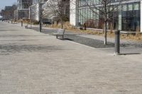 a building with glass on the sides is shown in this picture a bike is parked on the sidewalk