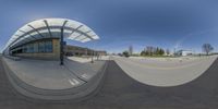 an upside down picture is of a skateboard park with the entrance and pavement being built into it