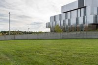 the building is made up of two floors, and it looks like it has a large building with glass on top