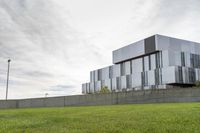 the building is made up of two floors, and it looks like it has a large building with glass on top