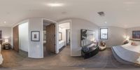 360 lens photograph of a spacious bedroom with bed and dressers in a modern residence