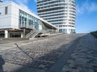 a building that's been designed to be connected with two roads with some stairs