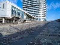 a building that's been designed to be connected with two roads with some stairs