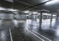 there is a empty parking garage with no people in it at night or day time